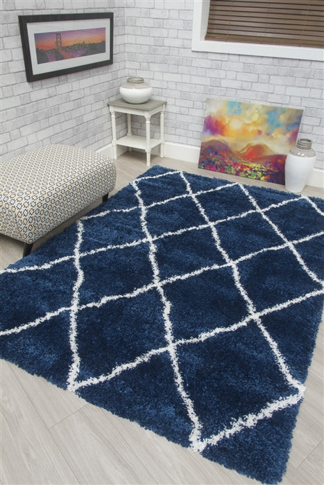 This Fantasy blue and cream shaggy rug offers versatility and luxury.